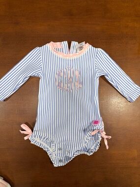 Ruffle Butts Blue & White Striped Long-Sleeve One-Piece with Pink Trim